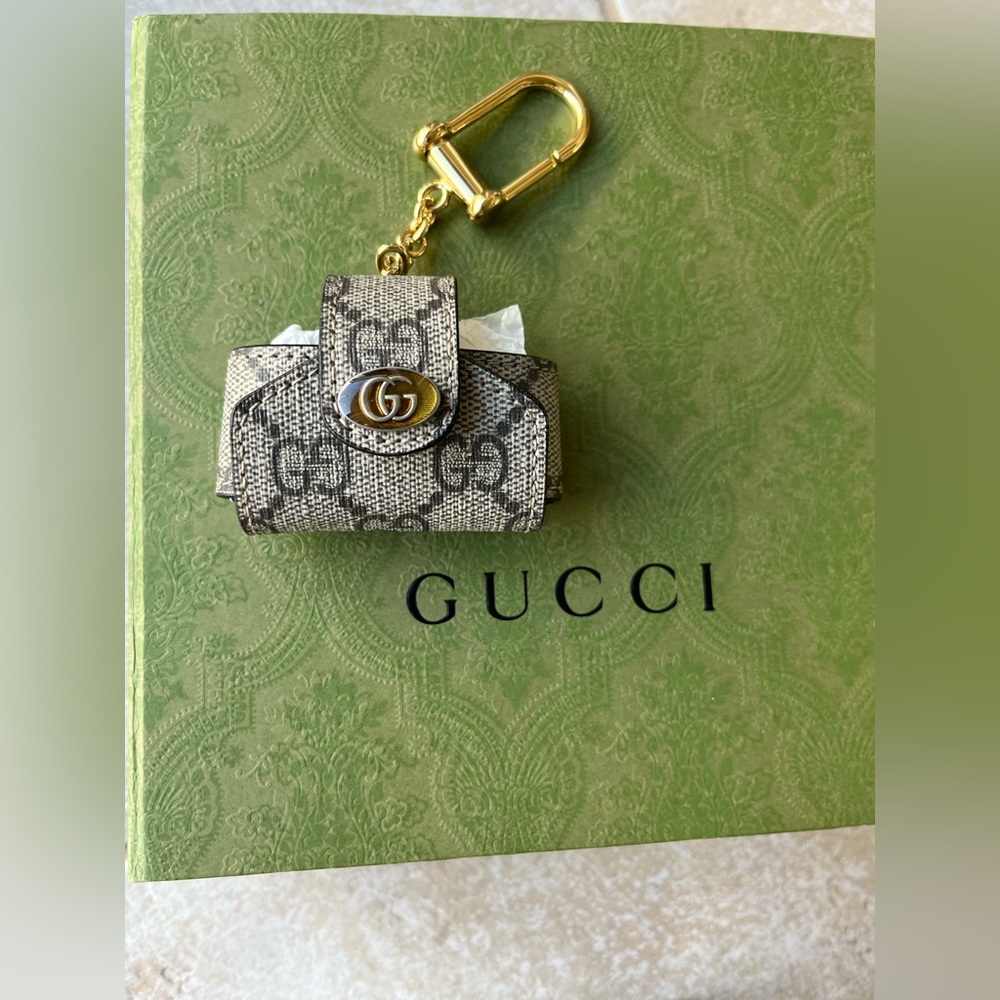 Gucci AirPod case.  Never used